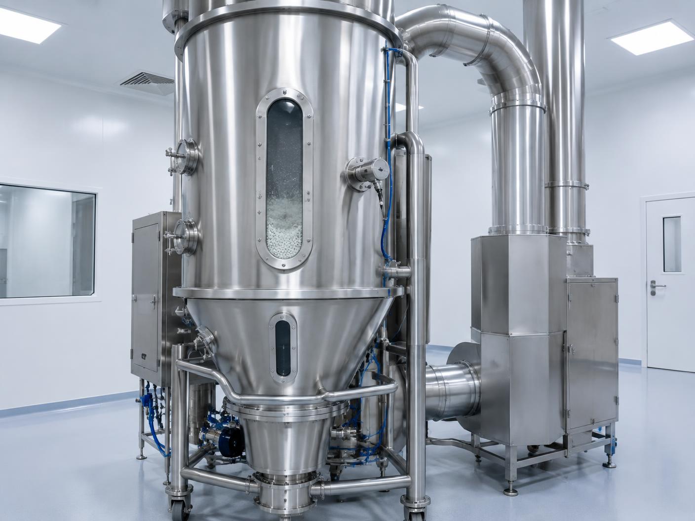 Close-up of stainless steel pharmaceutical processing equipment